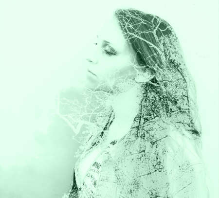 Among the trees womanの写真素材