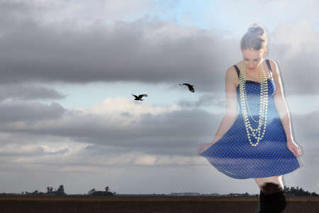 Woman on birdsの写真素材