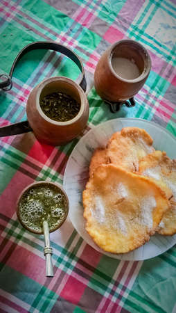 baiting mates with fried cakes at breakfastの写真素材
