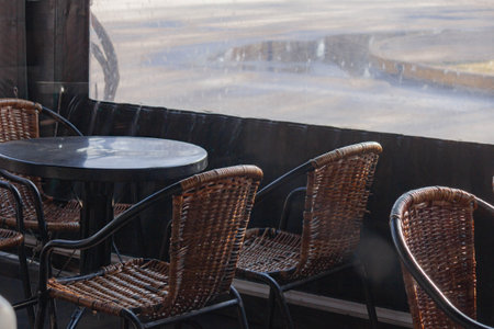 Tables and chairs in a cafe on the terrace of a restaurant