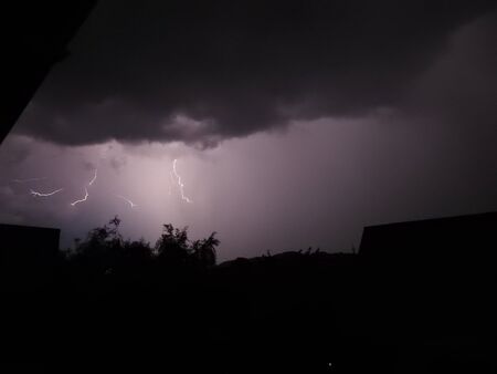 Lightning near a residential areaの写真素材