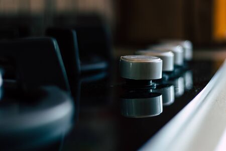 Closeup of gas cooker knobsの写真素材