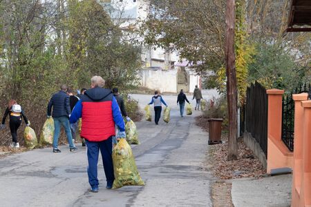 People gathering litter from natureの写真素材
