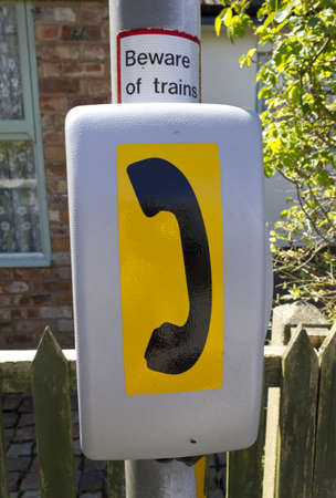 Emergency telephone by railway lineの写真素材
