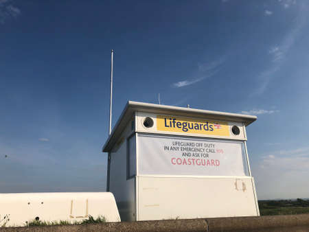 An art deco, white shelter near the beach, New Brighton, Wirral, logo, great british coast