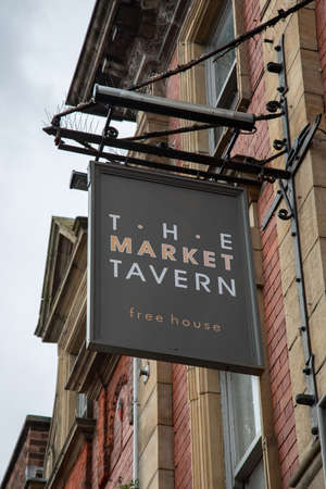 Exterior sign for The Market Tavern public house St Helens  Lancashire March 2019のeditorial素材