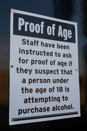 Sign outside a nightclub indicating staff will ask for proof of age Widnes Englandの写真素材
