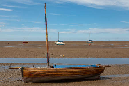 wooden boat on the beach Meols Wirral June 2019