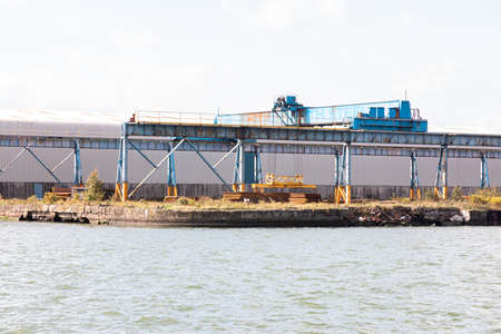 Cranes and metalwork for unloading and repairing ships atgreat float Birkenhead Docks Wirral...