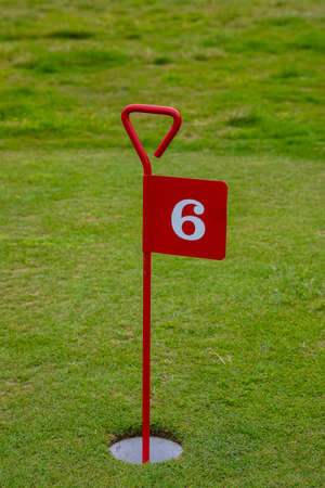 metal pin for mini golf hole at  lowther gardens lytham st annes fylde june 2019の写真素材