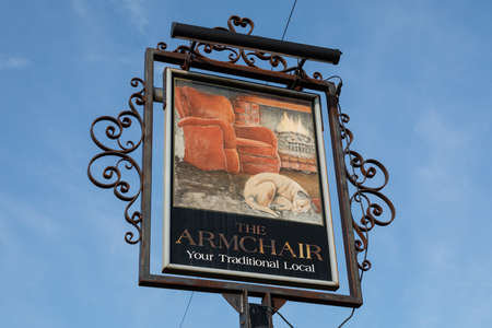 sign for The Armchair public house in Moreton Wirral August 2019のeditorial素材