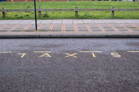 painted marking on road indicating taxi rank in Birkenhead Wirral January 2020の写真素材