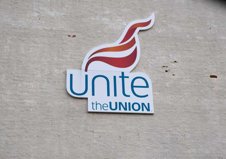 Logo of the union Unite on the side of a local branch in Birkenhead Wirral January 2020のeditorial素材