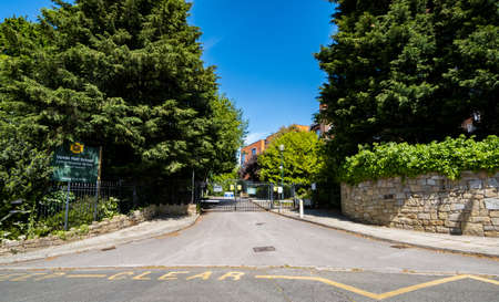 Small mounted modern red post box in Upton Wirral May 2020のeditorial素材