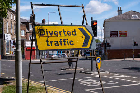 Small mounted modern red post box in Upton Wirral May 2020のeditorial素材