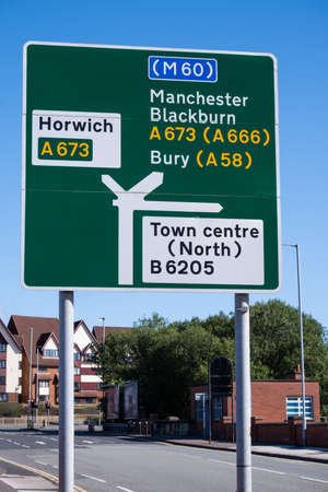 Town centre street sign for A roads and motorway in Bolton Lancashire July 2020のeditorial素材