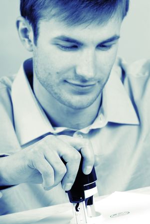 portrait, businessman seals on  document, close upの写真素材