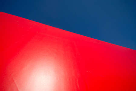 dynamical composition background of red and dark blue colorの写真素材