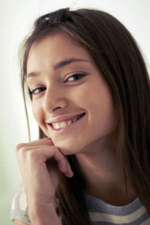 portrait of  young beautiful, smiling girl. close upの写真素材