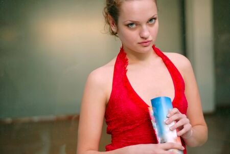 portrait of young woman with  book in handsの写真素材