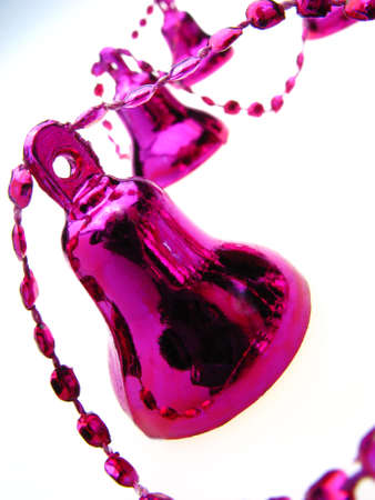 fur-tree toys an ornament handbells  lilac color on white backgroundの写真素材