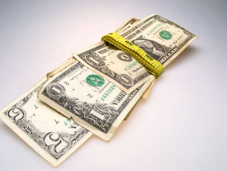 US dollar banknotes on light backgroundの写真素材