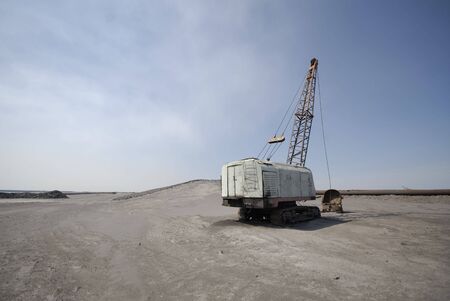 old thrown dredge,  mining industryの写真素材