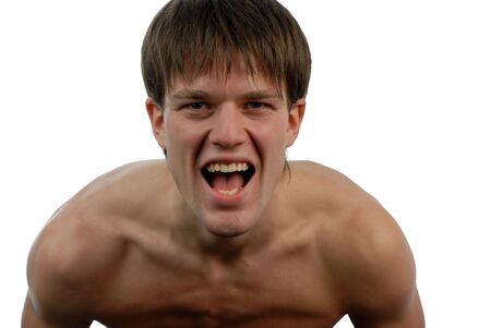 young man aggressively shouts on white backgroundの写真素材