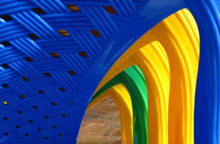 Fragment of plastic chairs covered by  sunlight, middayの写真素材