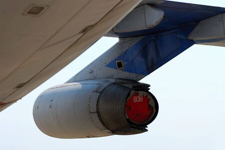  big transport plane on  background of  blue sky,  sunny day