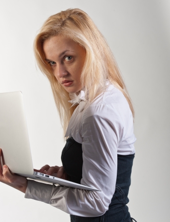 business woman, nice, looks in working as the laptopの写真素材