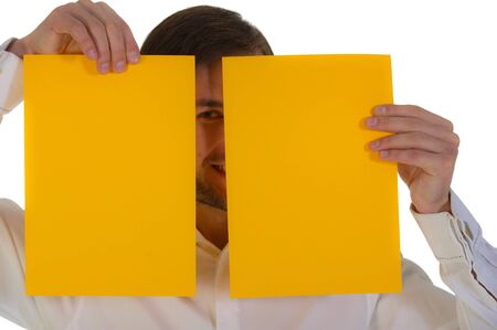 businessman with the yellow sheets of paper, isolated on a white backgroundの写真素材