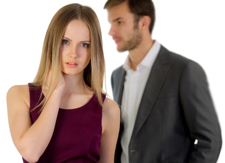 portrait of couple of smiling nice young people isolated on a white backgroundの写真素材