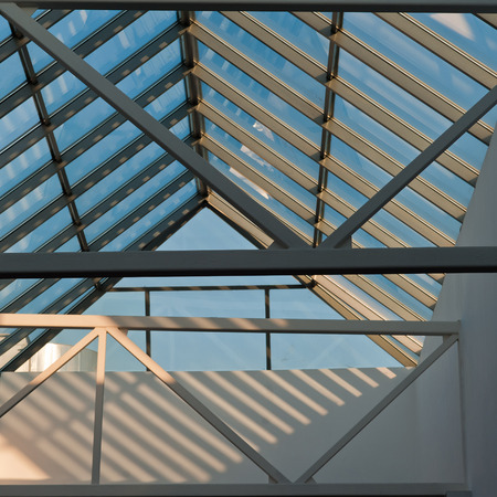 piece transparent roof of glass and concrete, sunny dayの写真素材