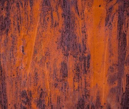 old sheet metal covered with rust and damaged paint