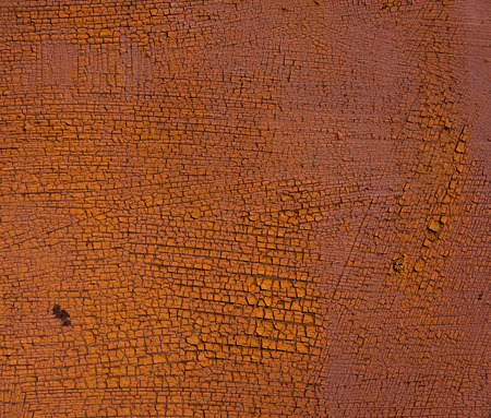 old rusty metal sheet covered with old paint residues