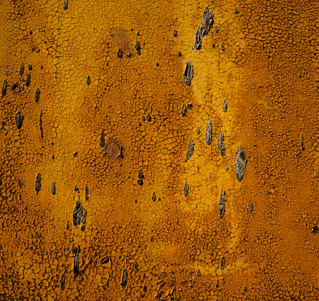 surface of a metal sheet coated with old peeling paintの写真素材