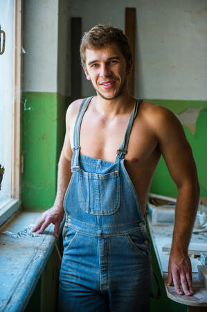 Portrait of a handsome man in the old roomの写真素材