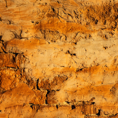 plaster surface of the old wall, sunny day