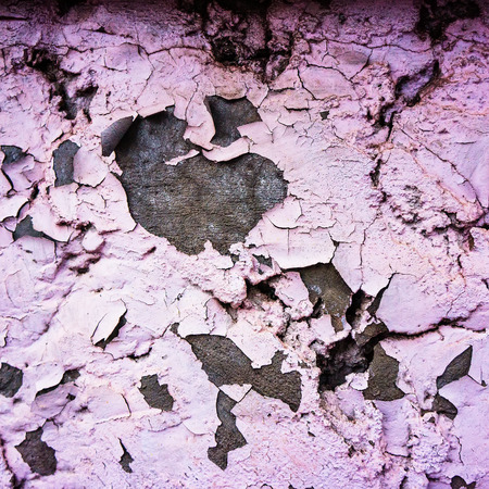 old weathered painted stucco brick wall collapsesの写真素材