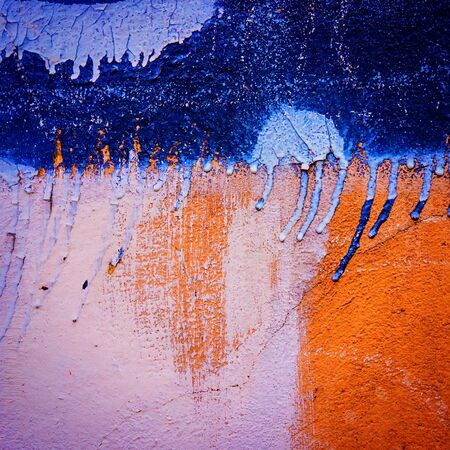 spilled paint on plaster wallsの写真素材