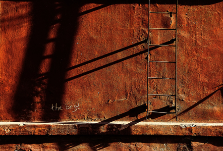 wall of the old residential building and fire escapeの写真素材