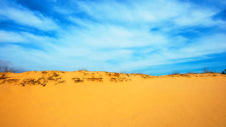 sand dune and blue sky, spring skyの写真素材