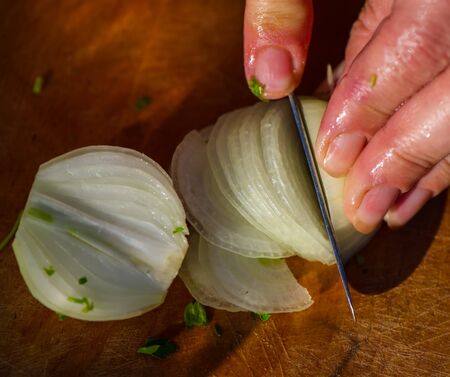 Cutting onion salad summer in the villageの写真素材