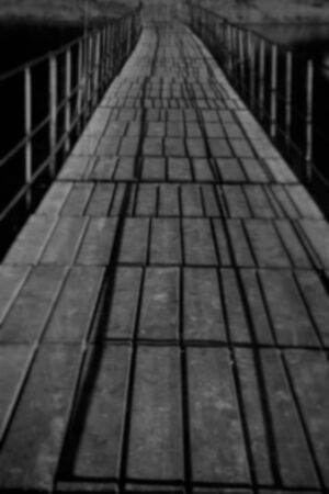 empty bridge over the river blurred backgroundの写真素材