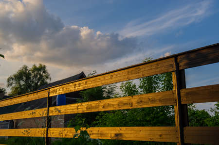 rural landscape wooden fence and treesの写真素材