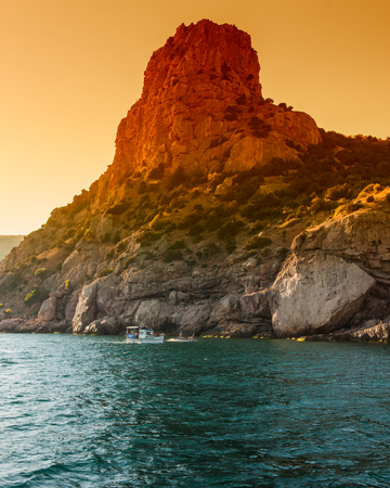 boat trip in the evening in the Bayの写真素材