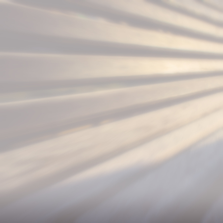 wooden fence, blurred background with a light toneの写真素材