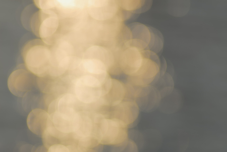 reflection in the water, blurred background with a light toneの写真素材