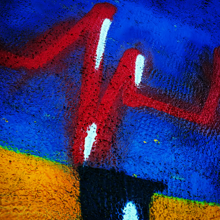 graffiti and colored spots on the wall, blurred backgroundの写真素材
